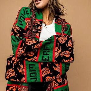 Dressed in LALA POWERFUL WOMAN TIGER cardigan